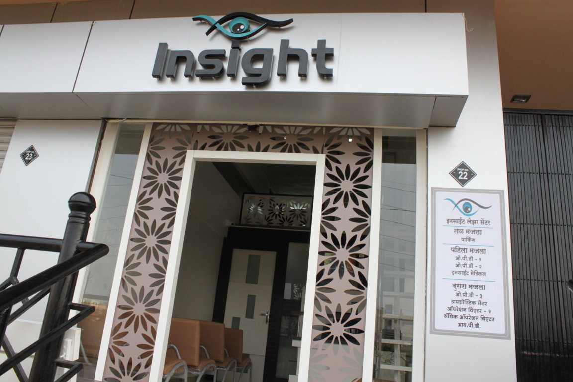 Insight Institute doorway from the street, with patient seating visible through the entrance and the brand marquee above the threshold